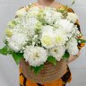 Композиция из эустомы и гипсофилы  в вязаном кашпо  - 3 970 руб.